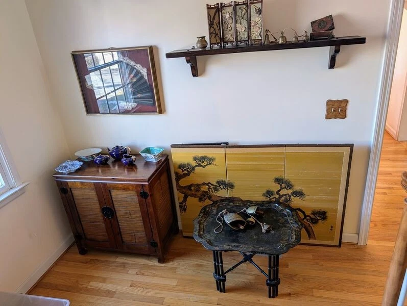 Antigua mesa de centro con base de metal/bambú Tole Foto 1 de 4