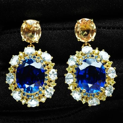 Glamorosos pendientes de oro de 24 quilates de plata de ley 925 de 19,70 quilates ovalados de zafiro azul real Foto 1 de 4