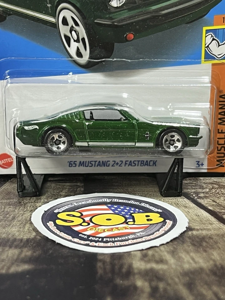 Ford Mustang 1965 tarjeta azul Hot Wheels 2+2 Fastback verde diecast sellado casi nuevo estado Foto 1 de 3