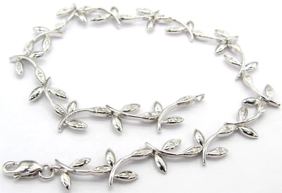 9CT GOLD DIAMOND BRACELET  0.15CT 9CARAT WHITE GOLD LEAF DESIGN HALLMARKED BOXED - Image 1 of 4