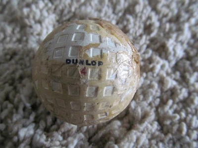 VINTAGE UNUSED WRAPPED MESH DUNLOP GOLF BALL W/PARTIAL WRAPPER  NICE FOR DISPLAY - Image 1 of 4