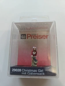 Preiser Mini-Figures 29028, Christmas Girl with a Sack of Gifts, HO Scale - Picture 1 of 4