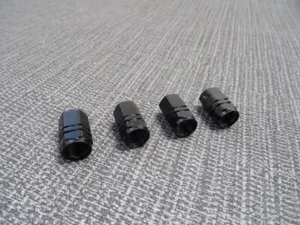 MERCEDES-BENZ BLACK ALUMINIUM METAL SOLID TYRE/WHEEL HEXAGON DUST VALVE CAPS x4 - Picture 1 of 12