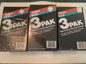 Lotto 9 (3x3) CUSTODIE VHS VIDEOCASSETTE Kmart vuote NOS confezioni sigillate - Foto 1 di 5