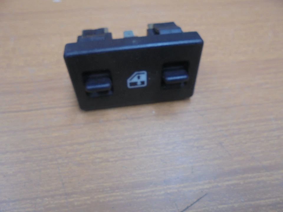 Fiat Uno 1st SERIES BROWN ELECTRIC WINDOW SWITCH NEW - Image 1 of 1