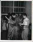1956 Press Photo Dody Sterne Adjusts Gilbert & Sullivan Players Sash