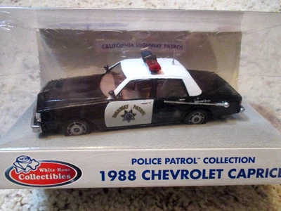 Chevrolet Caprice 1988 California Highway Patrol raro blanco rosa sellado 1/43 Foto 1 de 2
