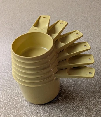 Vintage Tupperware Measuring Cups Set Of 6 pale yellow harvest gold 1/4 to 1 cup - Image 1 of 4