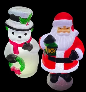 Stampi soffiaggio natalizio da interno illuminati da tavolo 11" set di 2 ~ Babbo Natale e pupazzo di neve - Foto 1 di 24