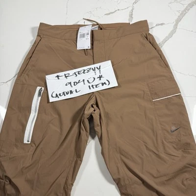 Pantalones Nike Sportswear tejidos utilitarios sin forro marrón DM6681-256 $85 para hombre talla 32 Foto 1 de 4