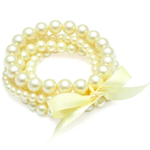 Eleganter Faux gelbe Perlen Strang Stretch Armreif Armband mit Schleife - Bild 1 von 3