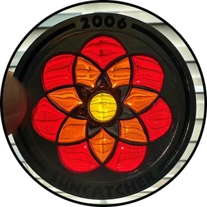 Geocoin 2006 SUNCATCHER Red & Orange Polished Nickel Activated & Adoptable - Picture 1 of 3