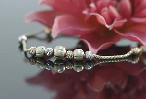 Armband in 585er / 14 Karat Tricolor Gold XXYY - Bild 1 von 5