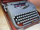 Machine à écrire portable vintage AMC France avec étui neuf encre et cuir