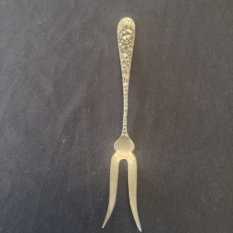 Sterling  ROSE LEMON FORK  4 3/4"   Marked Arc, Pattern Looks Almost Like Kirk Cover