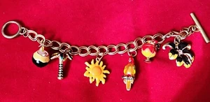 "Brazalete Dije Goldtone Cattleya Cóctel Loro Sol Palmera Esmalte de Coco 8" - Imagen 1 de 22