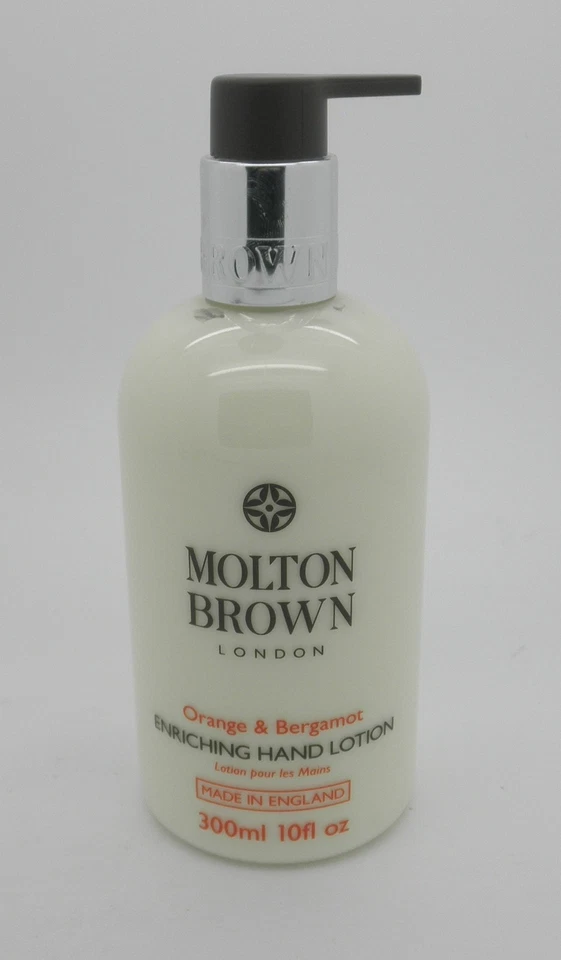 Botella bomba loción manual Molton Brown London naranja y bergamota 10 oz. Foto 1 de 1
