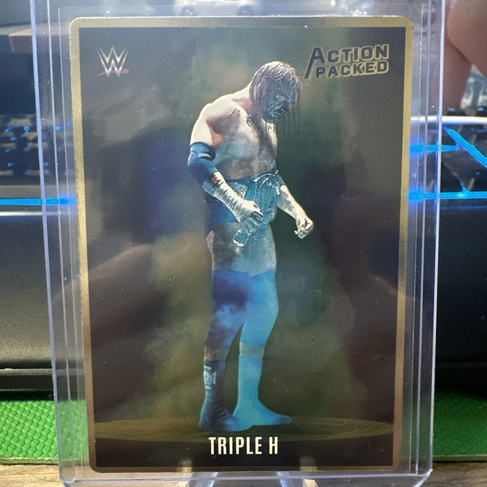 TRIPLE H -  2023 WWE Panini Chronicles Action Packed Insert 24k GOLD PARALLEL  - Image 1 of 2