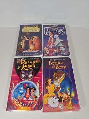 4 Disney Children (VHS) Films: Lady And The Tramp, Aristocrats, Beauty And The.. - Image 1 of 4