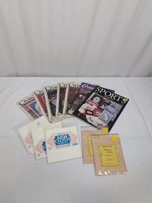 Lote de bordados. Incluye libros y tela de punto de cruz  Foto 1 de 4