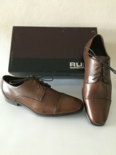 gordon rush medallion cap toe derby