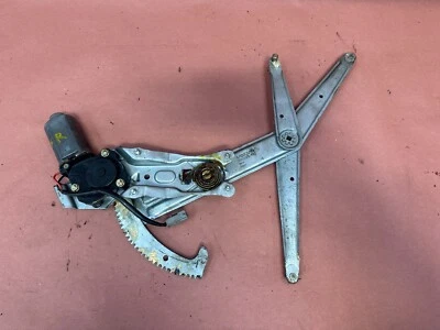 Motor regulador de ventana delantero derecho OEM #88255 Volvo 740 GLE Turbo 745 760 780 Foto 1 de 4