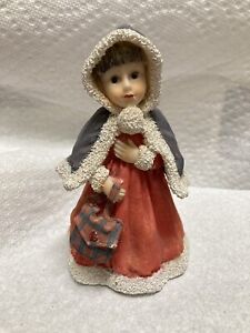 RESIN GIRL IN WINTER COAT WITH SATCHEL FIGURINE 5" TALL