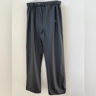 Pantalones de lluvia impermeables para hombre Helly Hansen negros talla grande cintura elástica dobladillo a presión Foto 1 de 4