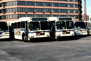5x7 COLOR PHOTO NYC BUS 1997 NEW-FLYER #1023, 1037 WESTSIDE DEPOT APRIL 1, 2000 - Picture 1 of 1