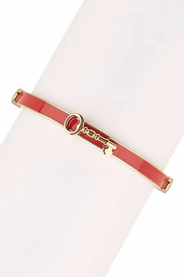 BRAZALETE FÓSIL DE MEDIOS MIXTOS ORO, ESMALTE ROJO, CORDÓN DE CUERO BRONCEADO, LLAVERO JOF00060710 Foto 1 de 3