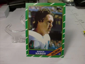 1986 Topps Football #51b - Bruce Hardy VAR - Miami Dolphins 86-010 - Bild 1 von 2