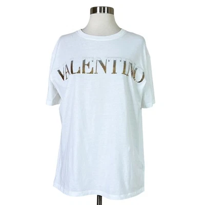 Valentino | Camiseta de diseñador de algodón blanco dorado plateado con logotipo de lentejuelas degradadas S Foto 1 de 4