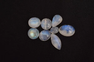 50 Cts. Natural White Rainbow Blue Flashing 15 mm to 7 mm Gemstone - Picture 1 of 2