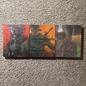 CALL OF DUTY BLACK OPS 6 MODERN WARFARE 2 AND 3 NEW LOT 3 STEELBOOK ONE DAMAGED - Picture 1 of 9