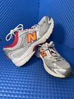 Women’s white/orange New Balance 553 running shoes size 5