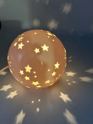 Celestial Star Projecting Effect Night Light White Ceramic Round Pierced Sphere - Image 1 of 4