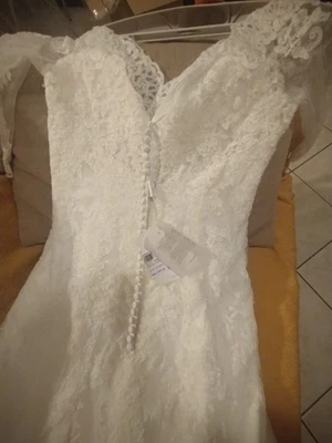 abito da sposa mai indossato tg 48 colore avorio scollo a V  - Immagine 1 di 4