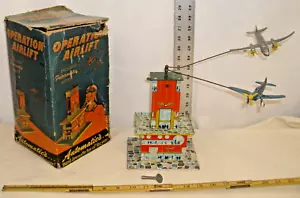 FUTURMATIC OPERATION AIRLIFT TIN WIND UP TOY BOXED WORKS - Picture 1 of 5