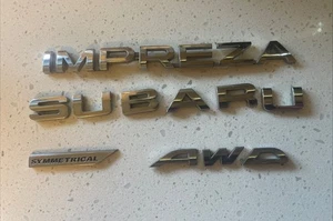 2012-2021 Subaru  Impreza AWD Plastic Rear Trunk Emblem OEM - Foto 1 di 4