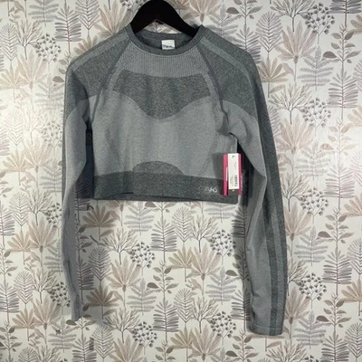 Top de entrenamiento recortado de manga larga sin costuras Ryka gris grande Foto 1 de 4