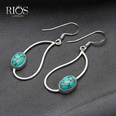 Handmade Sterling Silver Turquoise Dangle Earrings: Minimalist Teardrop Jewelry - Image 1 of 4