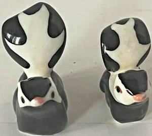 2 estatuillas de porcelana Hagen Renaker Skunk de colección - Imagen 1 de 6