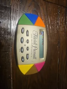 Trivial Pursuit The Best of Genus Electronic Handheld Portable Game 1997 TESTED - Picture 1 of 9
