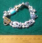 Vintage enamel on white metal  Shoes and bags Charm beads  bracelet elasticated 
