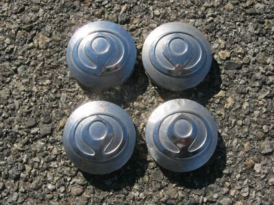 Tapacubos centrales de llantas de aleación pulida Mazda 626 Millennia de fábrica Foto 1 de 4