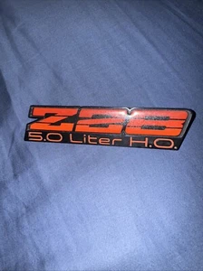 1983 - 1986 Chevrolet Camaro Z28 5.0 Liter H.O. Dash Emblem Badge Genuine GM OEM - Picture 1 of 2