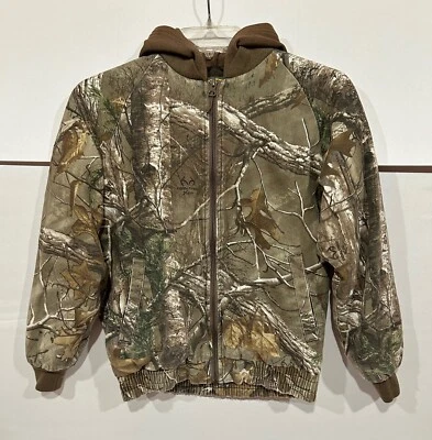Chaqueta con Capucha Juvenil BASS PRO SHOPS Camuflada Realtree Xtra Forrada con Edredón Juvenil Talla L Foto 1 de 4