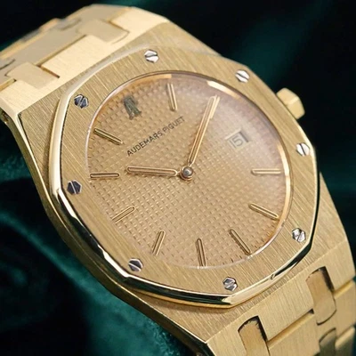 Audemars Piguet Royal Oak Cuarzo Esfera Champagne Oro Amarillo 33mm COMO NUEVO 56175BA Foto 1 de 4