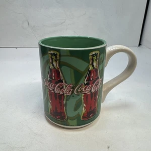 Coca Cola Coffee Mug Green Ceramic with Coke Bottles 1998 by Gibson - Picture 1 of 4