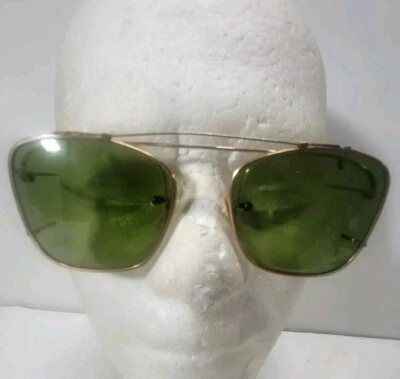 Gafas de sol vintage Polaroid tono dorado lentes verdes con clip talla mediana con estuche Foto 1 de 4